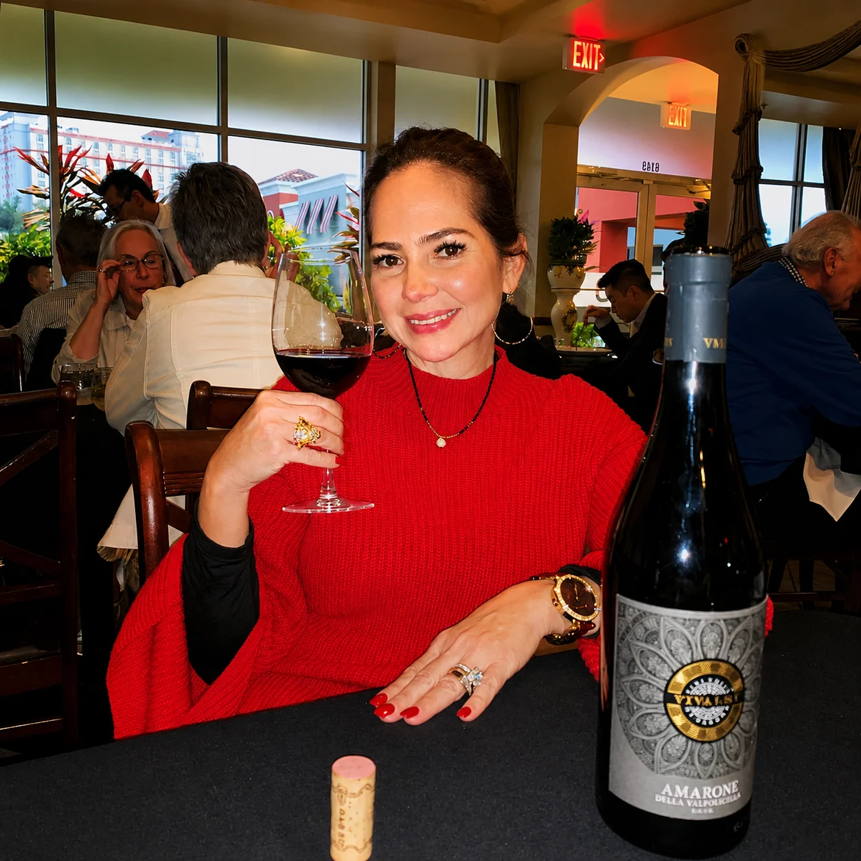 Guest enjoying wine at Ciao Italia Ristorante Orlando